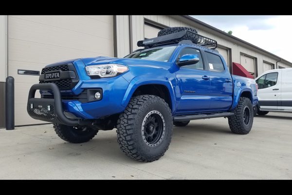 Blue pick up truck with roof rack Blue pick up truck with roof rack
